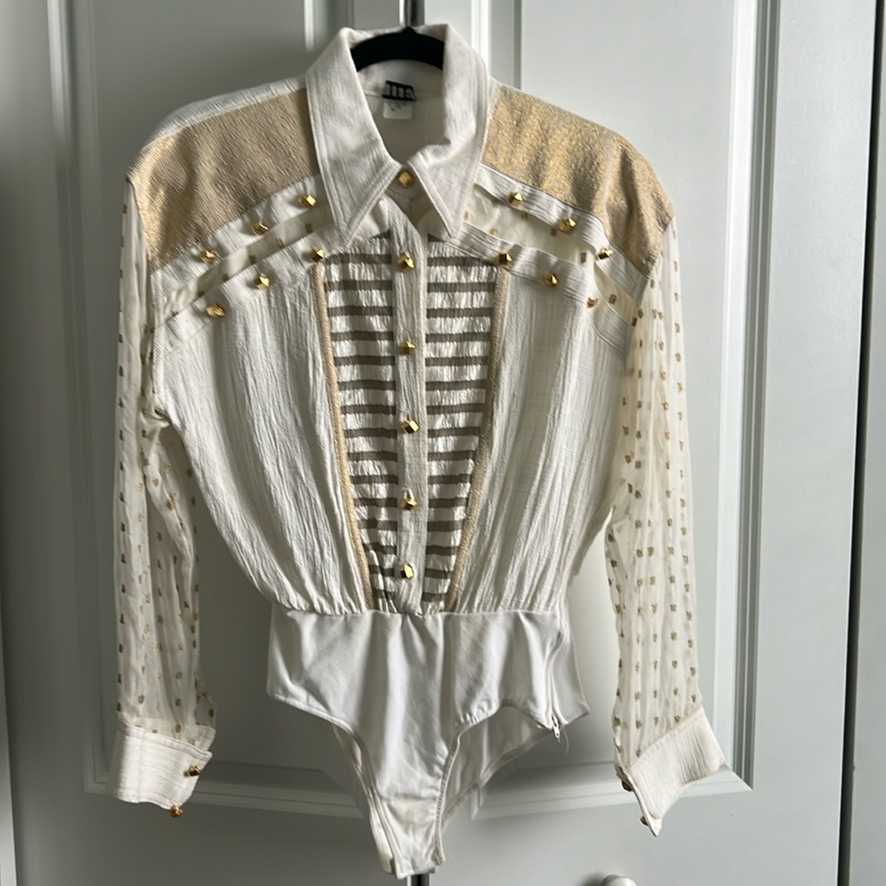 Two piece wide leg pants with bodysuit.  silk with gold accents,buttons.